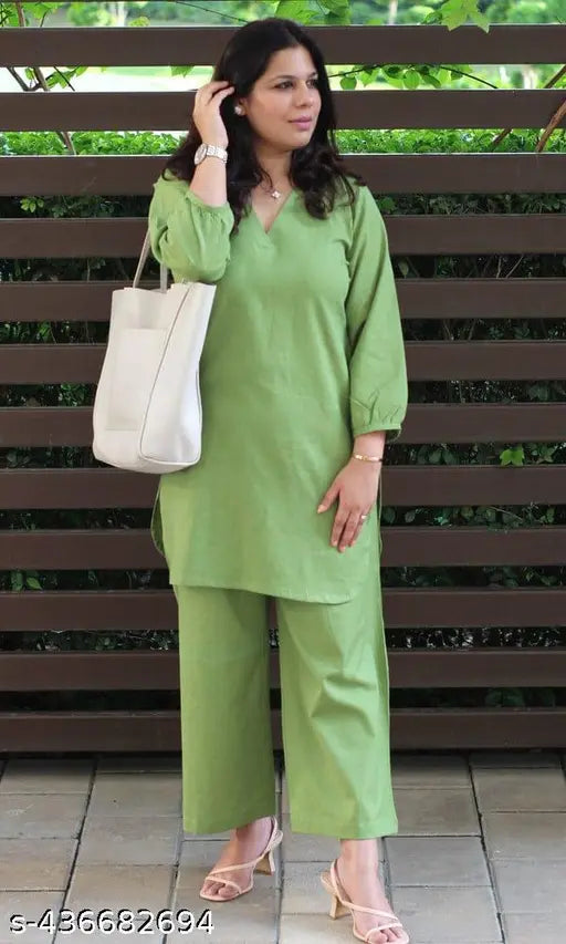 Olive green cotton solid kurta pant set for women, three-quarter sleeves, fully stitched, new launch in beige, bottle green, mustard, black, light purple, baby pink, and more. Perfect addition to your casual or office summer wardrobe. India origin