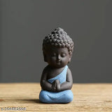 Blue resin baby Buddha statue, intricately designed antique-style figurine by Indian artists, measures 10cm x 10cm x 10cm (LWH). Handle with care