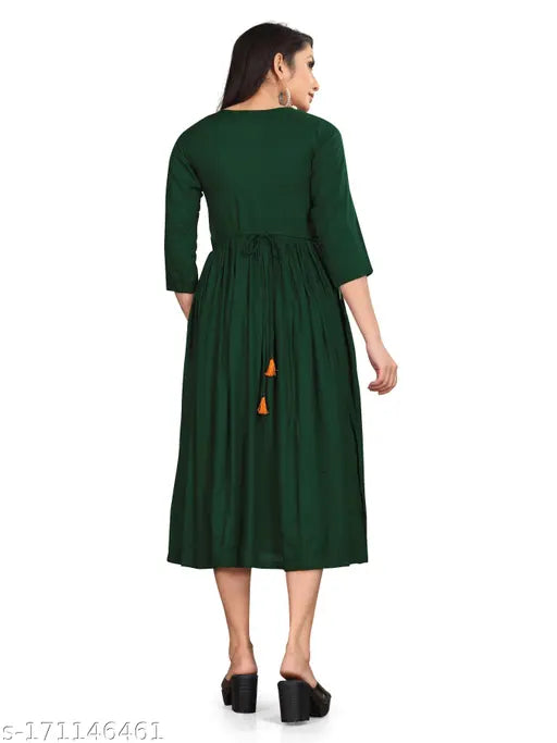 Green embroidered viscose rayon A-line Kurta with three-quarter sleeves. Traditional Indian women's clothing for functions, receptions, weddings, and events