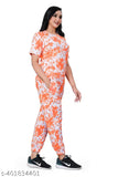 Orange cotton-blend coords set for women, featuring a printed top and trouser bottom, traditional multi-color design, perfect for summer or winter. Made in India
