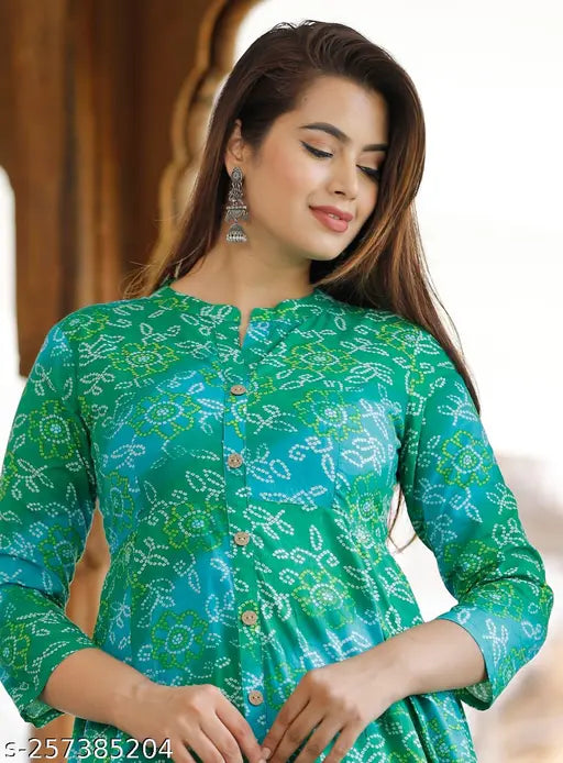 Green cotton bandej printed anarkali dress, mandarin collar and three-quarter sleeves for women, Indian ethnic wear on mannequin