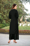 Rayon ethnic festival wear kurta with palazzo, solid net, three-quarter sleeves. Indian mirror work on classic sharara style." (123 characters)