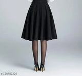 Black polyester skirt, trendy and chic, available in sizes 28, 30, 32, 34 (waist 28-34, length 23in) made in India