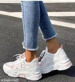 White mesh kids' casual sneakers, solid design with lace-up fastening, rubber sole, size N available in sizes 4 to 8. Made in India