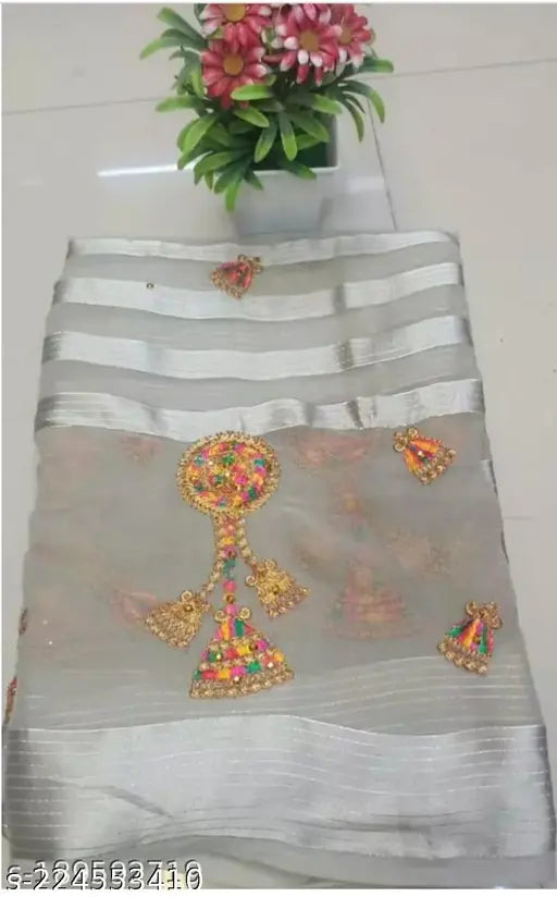 Gold chiffon saree with zari woven net, multi embroidery, free size from Sunil Saree, India