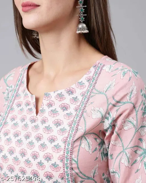 Pink flared Anarkali kurti, pure cotton with printed combo, three-quarter sleeves. Single Surya Creation kurti for women on display. Machine washable, MRP Rs. 2,299 (varies by size). Indian-made, marketed and manufactured by Surya Creation Private Limited