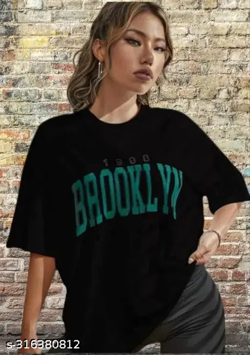 Black cotton oversize brooklyn t-shirt with off-shoulder design, printed pattern, three-quarter sleeves. Size XS (36in bust, 25in length). Women's fashion, summer clothes, Meesho shopping