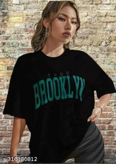 Black cotton oversize brooklyn t-shirt with off-shoulder design, printed pattern, three-quarter sleeves. Size XS (36in bust, 25in length). Women's fashion, summer clothes, Meesho shopping
