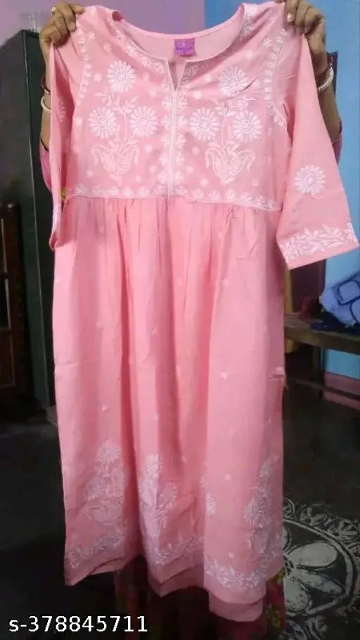 Pink embroidered rayon Anarkali Kurta for women, three-quarter sleeves. Handmade in Jaipur, India, by New Kurti brand. Boat neck design. Quality check passed 6 times." (118 characters)