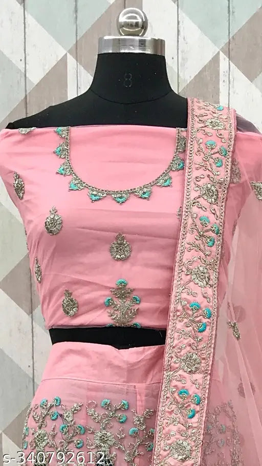 Heavy pink net embroidered Lehenga Choli with semi-stitched blouse and dupatta, perfect for festive occasions. Indian designer work
