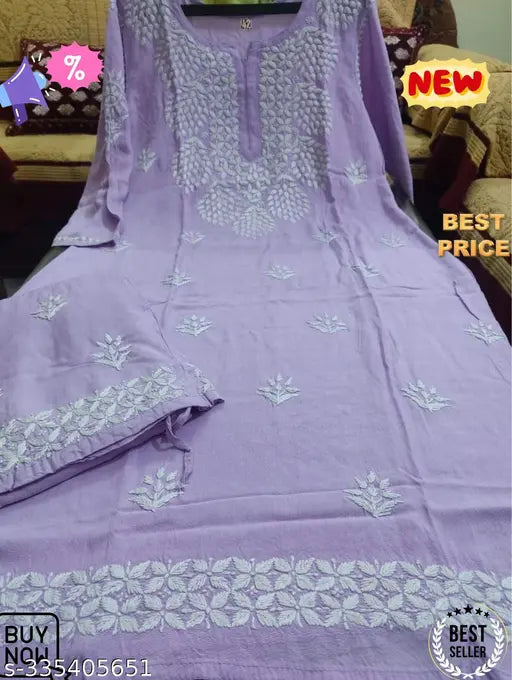 Rayon embroidered kurta with palazzo pants, intricate woven design on display