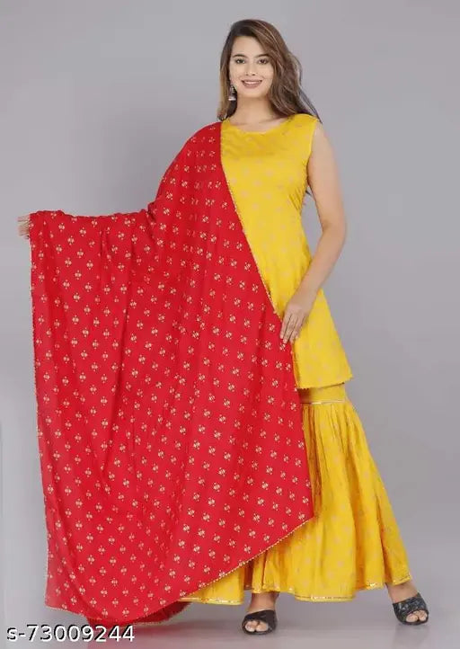 Mustered gold printed rayon kurta set with sharara and dupatta, Indian traditional clothing on display