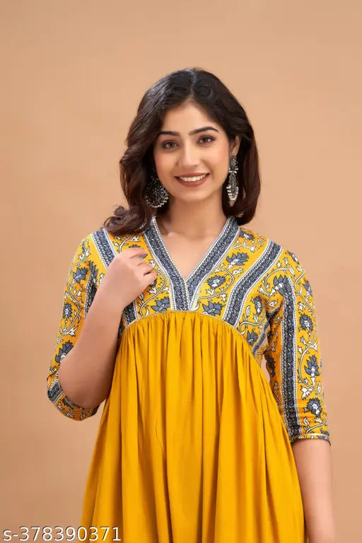 Rayon mustard printed women's flared kurta with three-quarter sleeves, vibrant design for trendy parties, S-XXXL sizes available, Indian origin