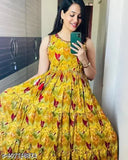 Cotton blend yellow printed Anarkali gown for women and girls, sleeveless full-length design with floral pattern. Perfect for summers under $300. Made in India
