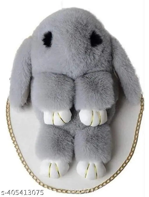 Synthetic, fluffy bunny sling bag with chain and smooth zipper. Soft, solid-colored crossbody handbag for kids or girls under 100, perfect for school or travel