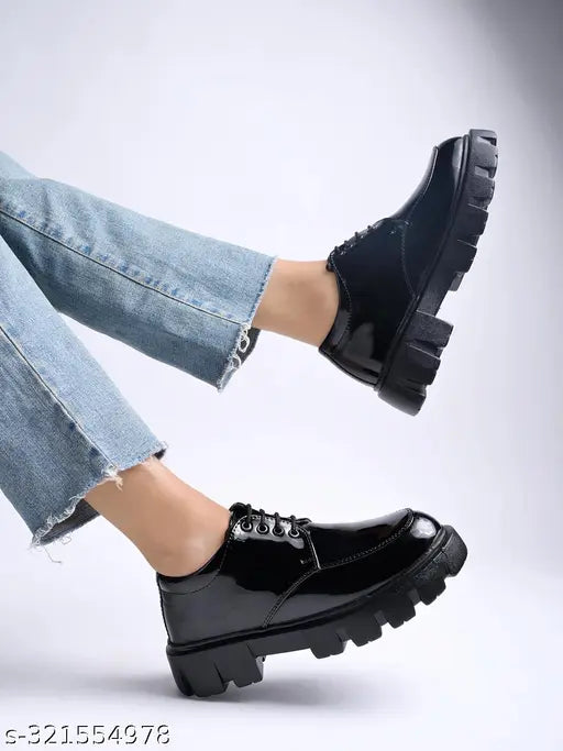Patent leather black loafers for women - detailed lace-up style, slip-on classic ballerinas from Stylestry (India)