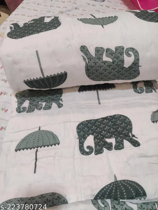 Reversible cotton Jaipuri single quilt, breathable & soft, ideal for mild winter use