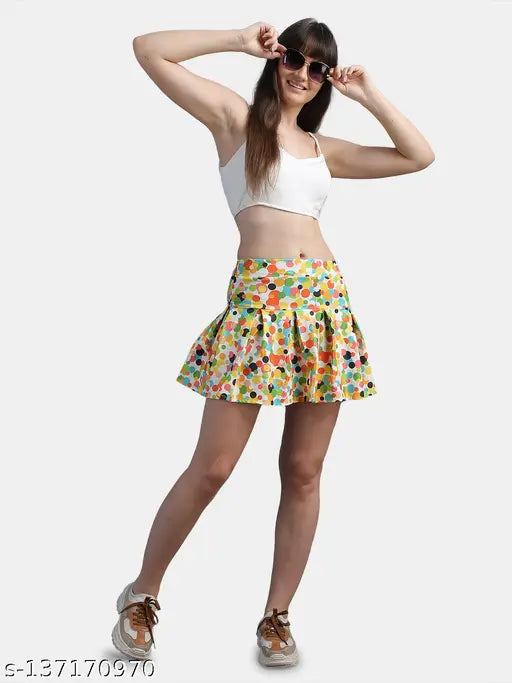 Polyester printed net mini skirt with attached inner shorts, plaid skater style for all seasons. Sizes: 28, 30, 32, 34, 36 (India origin)