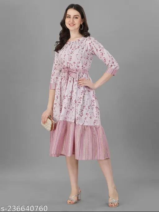 Purple floral printed cotton kurti, fit & flare design with three-quarter sleeves, perfect for parties or events, India origin