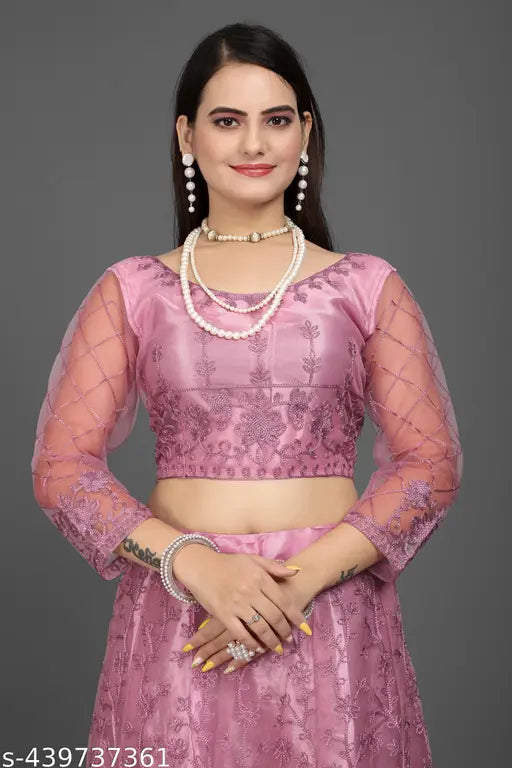 Elegant pink net semi-stitched Lehenga Choli with extra inner and dupatta, ideal for weddings, festivals, and parties. Hand-embroidered Indian bridalwear with georgette blouse and net bottomwear