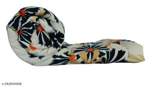 Multi-color cotton printed baby quilt by Taj Overseas, ideal for mild winter and crib use, machine washable