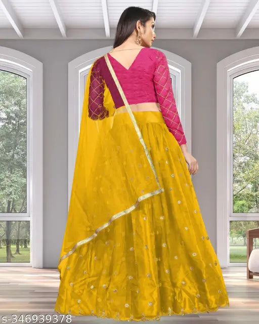 Embroidered semi-stitched silk blend lehenga choli and net dupatta set, free size. Handcrafted Indian wedding wear for parties or festive occasions