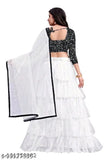Black & White embroidered Lehenga Choli with Dupatta, free size net fabric for women. Ornamental Indian traditional wear featuring solid dupatta and embellished top and bottom pieces