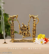 Gold-plated metal Radha Krishna swing jhula statue (Medium Size), handcrafted Indian artware by Pranchi Metals