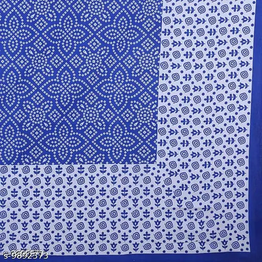 Cotton blue Sanganeri print double bed sheet with matching pillow covers, featuring chunri pattern on queen-sized bed and pillows