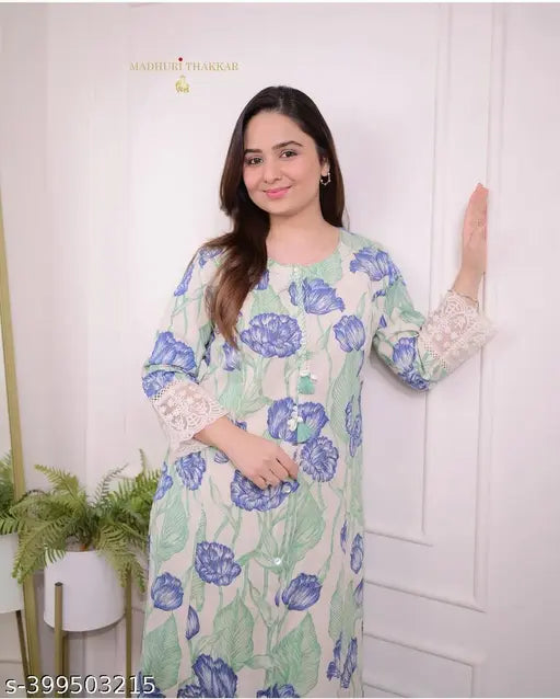 Blue women's rayon kurti set with dupatta and pants, printed net design on display. Three-quarter sleeves, sizes M to XXL. Indian handcrafted rayon kurti set