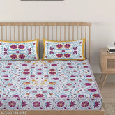 White printed cotton flat sheets set, superfine floral design, adult-sized summer bedding collection, 2 pillow covers included, size: 90"x108", origin: India (alt text for an image of the double queen sized white printed cotton bedsheet set on a bed)