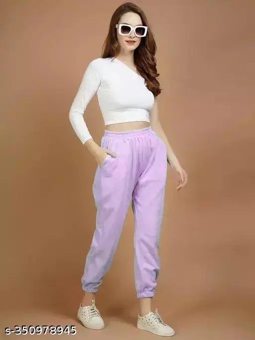 Black woolen fleece joggers with lavender combo, women's winter leisure pants with elastic waistband, deep side pockets, and full-sleeve design for sports, gym, or running. Made in India