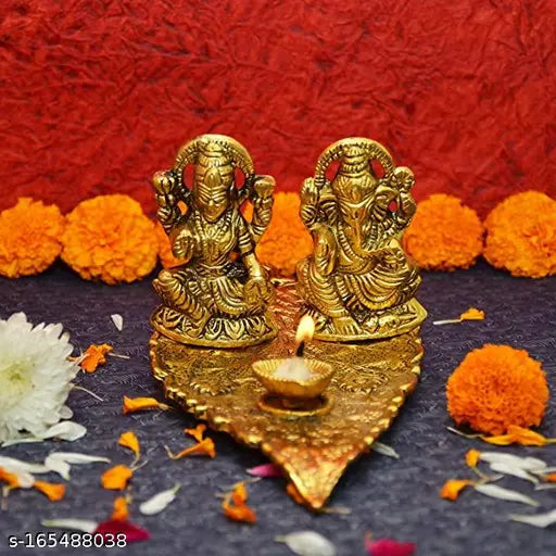 Golden terracotta Lakshmi Ganesh statue for Diwali Puja, handcrafted Indian religious idol