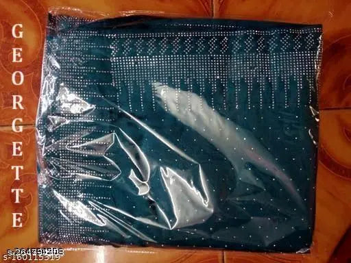 Georgette saree with Swarovski hotfix diamonds, modern design in Rama color