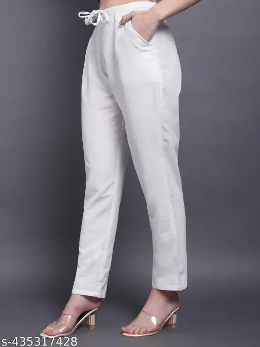 White cotton women's trousers with side pockets, drawstring waistband, and elastic, available in various sizes S-XXXL