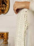 Georgette embroidered kurta and sharara set with sequin embellishments, three-quarter sleeves, side tie-ups, and matching dupatta. India-made fashion for women's ethnic wear
