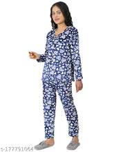 Navy blue velvet all-over heart printed women's lightweight winter night suit set with long sleeves, featuring top and pyjamas. Cozy, wrinkle/shrink-free fabric for comfort and style during sleep and daily life. Perfect gift for special occasions. Made in India