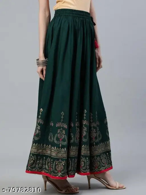 Rayon printed net combo skirt, one black and one green, Jaipuri gold design for women's festive wear. Size range from waist 26-38 inches, normal wash only