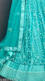 Sea Green Elegance Lehenga Choli Set with Dupatta and Blouse - Embroidered Indian bridalwear on display