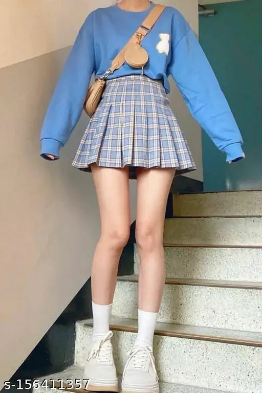 Checked cotton Caracola mini skirt for women and girls, stylish high-waisted pleated skater tennis skirt with a net pattern