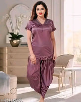 Stylish wine-colored satin night suit set with patiala pants and top, suitable for women's formal occasions like weddings or honeymoons