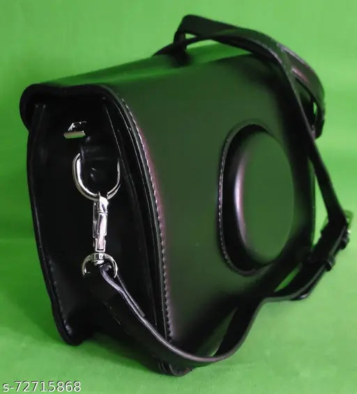 Black synthetic slingbag with adjustable shoulder strap and flap closure, ideal for girls. Self-designed net pattern. One compartment, free size. Made in India
