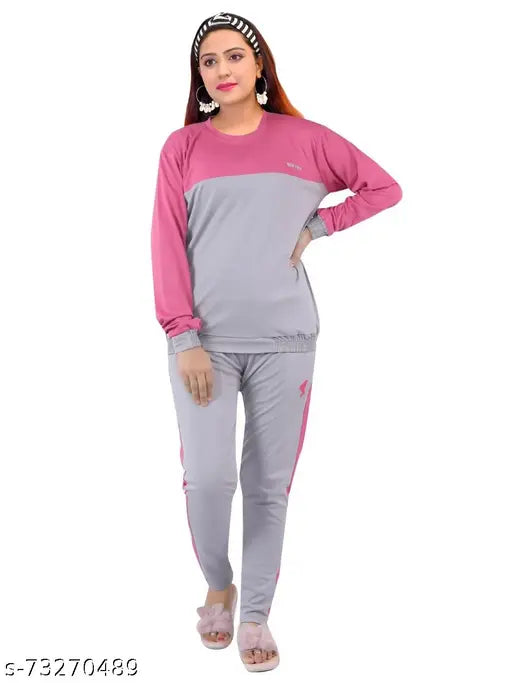 Colorblocked polyester woman's tracksuit with long sleeves, lightweight fabric, round neck top, elastic waistbottom, and side pockets - India-made gym wear / sportswear