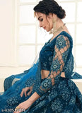 Traditional ethnic net lehenga-choli set with embroidered dupatta, ideal for festive occasions or bridal wear. India origin