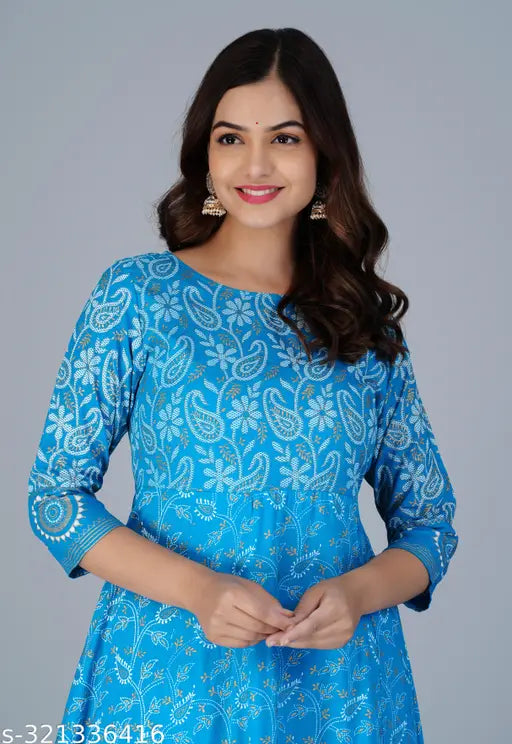 Rayon printed Chitrarekha Graceful Kurtis with three-quarter sleeves, vibrant Indian fashion for women. S (36in/47in), M (38in/47in), L (40in/47in), XL (42in/47in), XXL (44in/47in), XXXL (46in/47in), 4XL