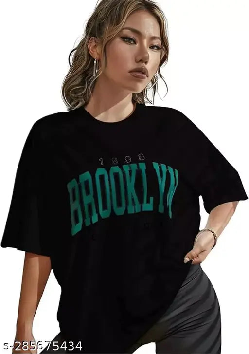 Black cotton blend oversize t-shirt (Brooklyn style), loose fit with off-shoulder design for women, three-quarter sleeves, printed net pattern. Size: S (38 in bust, 26 in length)