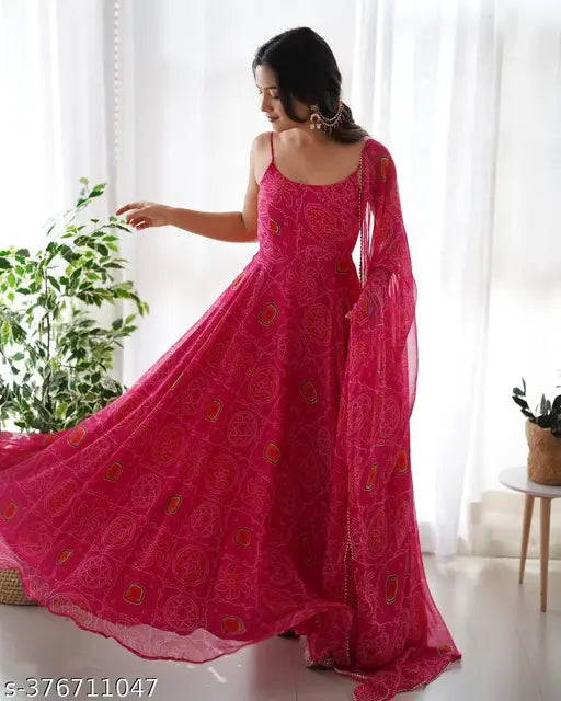 Pure orange chiffon floral print Anarkali with dupatta set, soft lightweight chiffon fabric, ready-to-wear Indian bridal gown on display