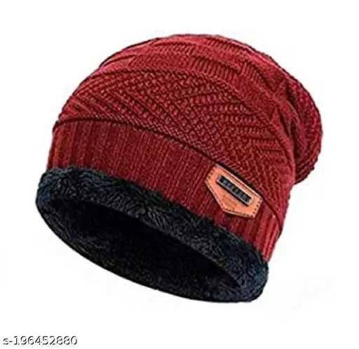 Red wool beanie cap, slouchy textured knit style with fur net, ideal for men and women this fall/winter. Soft acrylic interior with fur exterior. Origin: India