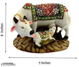 Multicolor Polyresin Kamdhenu cow and calf statue, decorative showpiece for home or office - spiritual, auspicious symbol of divine protection