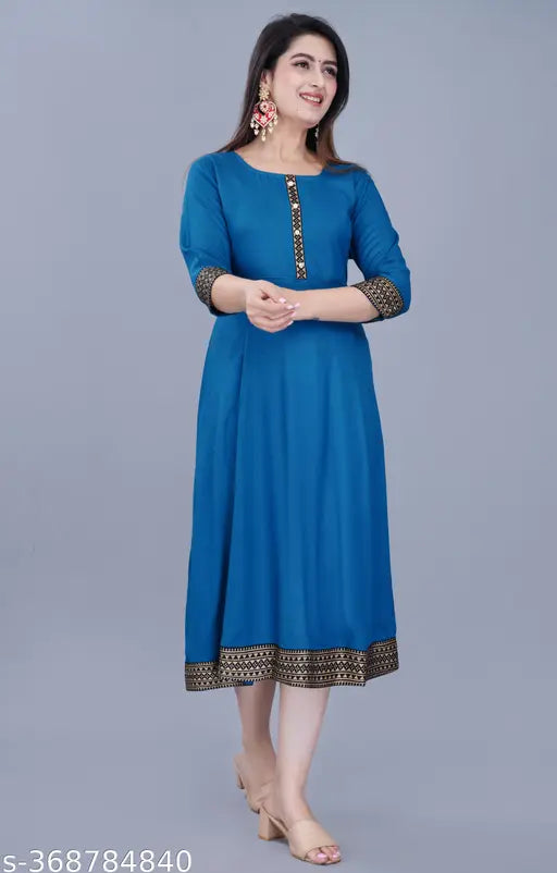 Rayon anarkali kurti for women with three-quarter sleeves, solid combo, available in various sizes from S to XXXL. Indian traditional dress on mannequin